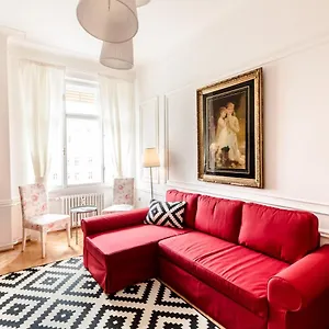 Golden Esthetic With Red Sofa Apartamento